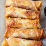 Crispy Mozzarella Ham Egg Rolls: A Deliciously Gooey Snack for Any Occasion
