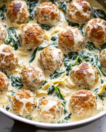 Baked Turkey Meatballs in Creamy Spinach Artichoke Sauce: A Comforting High-Protein Dinner You’ll Crave
