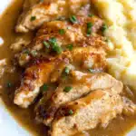 Savory Chicken Cutlets with Buttery Gravy and Cheesy Mashed Potatoes Recipe
